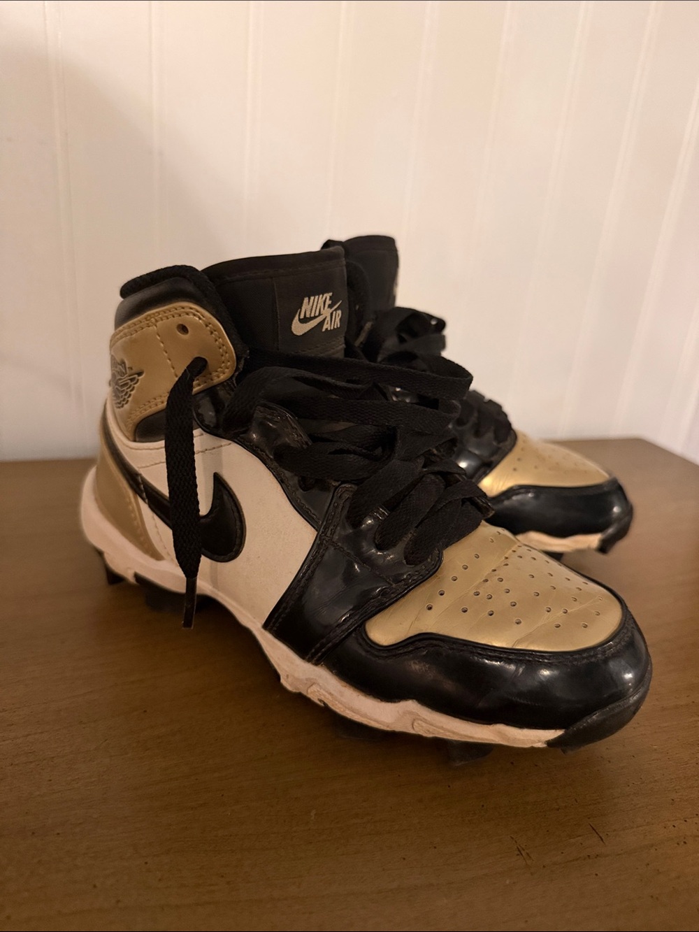 Nike Kids Black, Gold and White High-Top Sneaker cleats